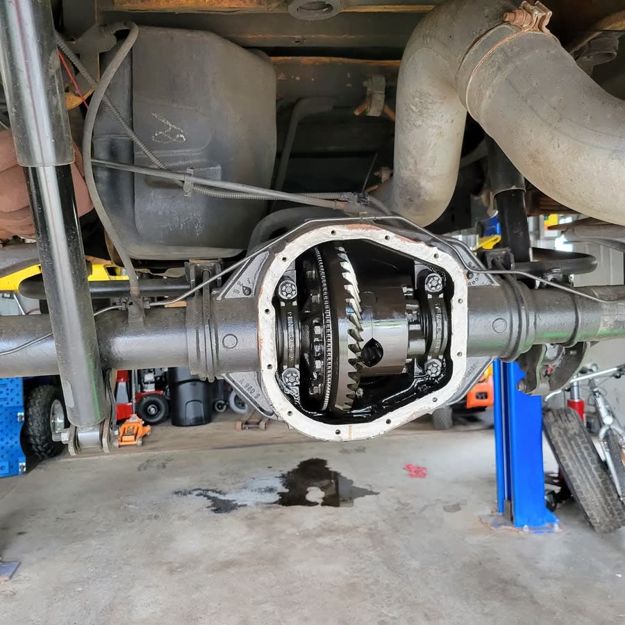 Rear differential opened for service under a truck